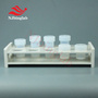 Round, flat, conical bottom PFA Vials with 10 hole bracket